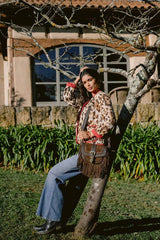 Piti Cuiti Umhängetasche aus Leder in Braun mit Fransen