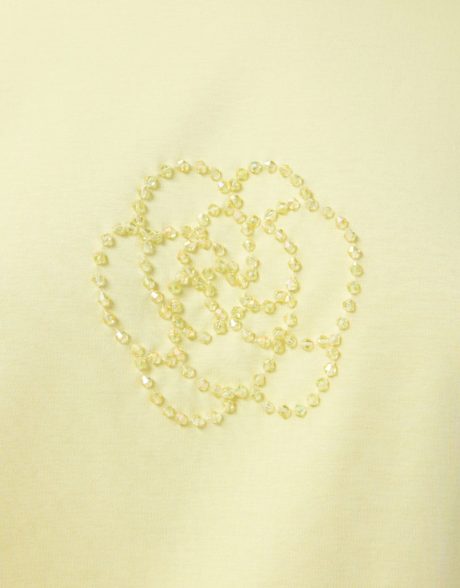 T-.Shirt "Carolina" in zartem Gelb mit floralem Motiv aus Glitzerperlen - Leo & Ugo