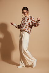 Produktbild - Zwillingsherz Leo Soft Pullover mit orangefarbenen Akzenten